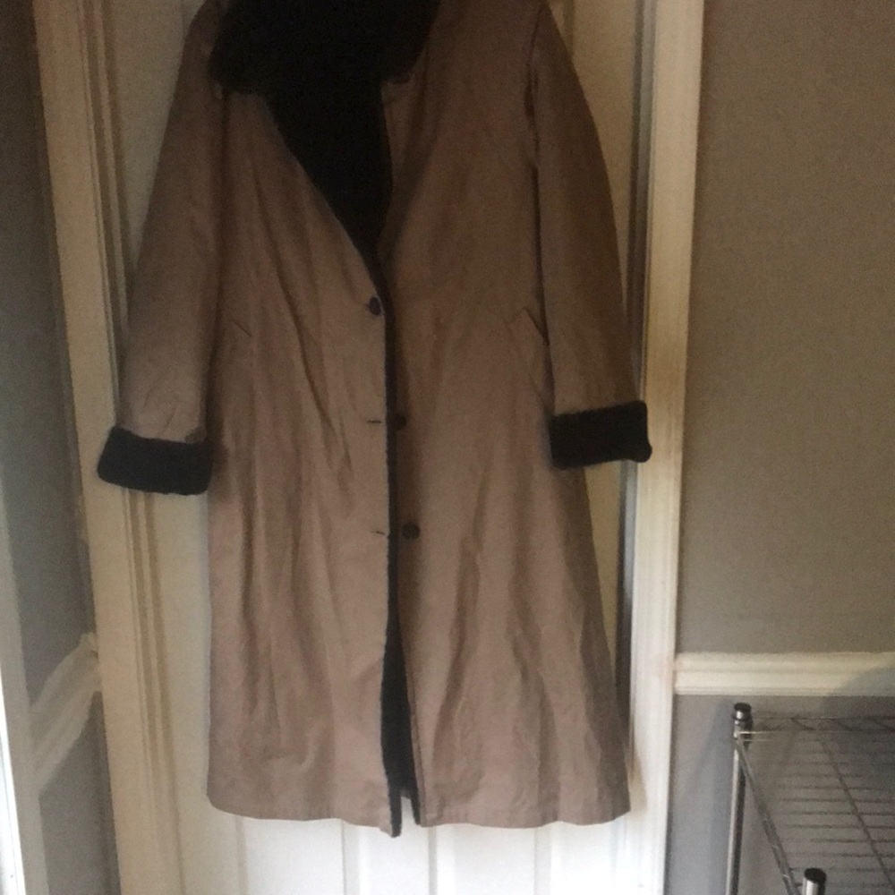 Reversible water proof trench coat